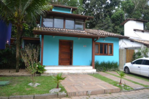 Casa 32 no condomínio Pereque-Açu com playground e piscina